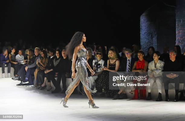 Naomi Campbell walks the runway as guests including Letitia Wright, Eva Green, Francois-Henri Pinault, Cate Blanchett, Dame Anna Wintour, Elle...