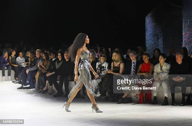 Naomi Campbell walks the runway as guests including Letitia Wright, Eva Green, Francois-Henri Pinault, Cate Blanchett, Dame Anna Wintour, Elle...
