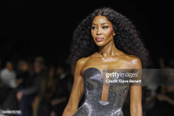 Naomi Campbell walks the runway at the Alexander McQueen SS24 show during Paris Fashion Week at Le Carreau du Temple on September 30, 2023 in Paris,...