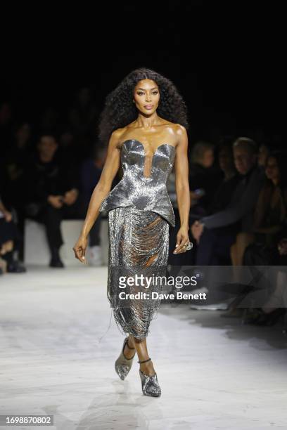 Naomi Campbell walks the runway at the Alexander McQueen SS24 show during Paris Fashion Week at Le Carreau du Temple on September 30, 2023 in Paris,...