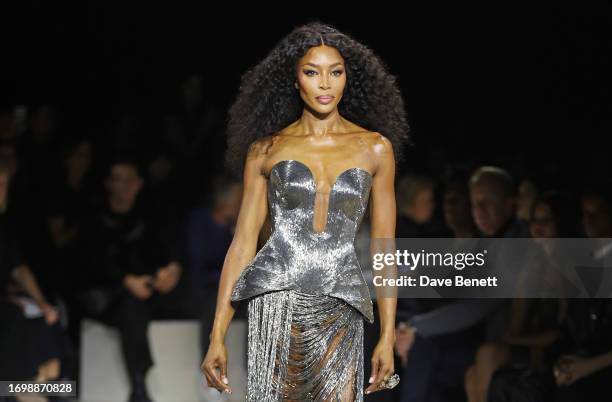 Naomi Campbell walks the runway at the Alexander McQueen SS24 show during Paris Fashion Week at Le Carreau du Temple on September 30, 2023 in Paris,...