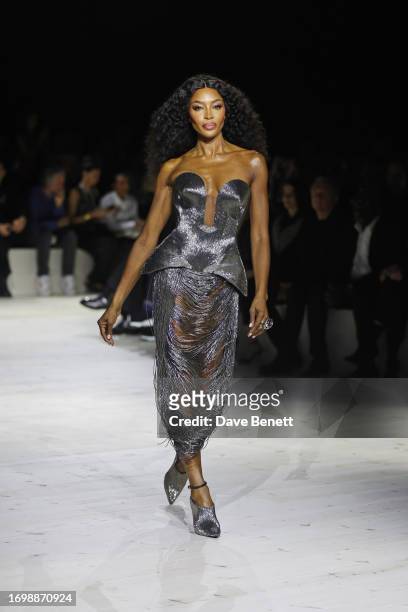 Naomi Campbell walks the runway at the Alexander McQueen SS24 show during Paris Fashion Week at Le Carreau du Temple on September 30, 2023 in Paris,...