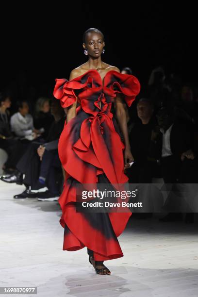Model walks the runway at the Alexander McQueen SS24 show during Paris Fashion Week at Le Carreau du Temple on September 30, 2023 in Paris, France.
