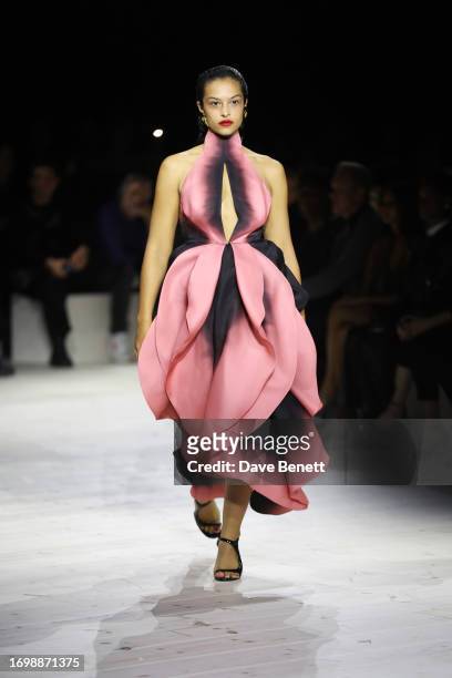 Model Devyn Garcia walks the runway at the Alexander McQueen SS24 show during Paris Fashion Week at Le Carreau du Temple on September 30, 2023 in...