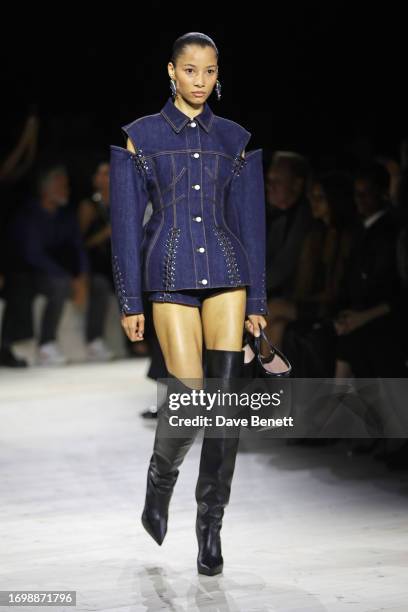 Model Lineisy Montero walks the runway at the Alexander McQueen SS24 show during Paris Fashion Week at Le Carreau du Temple on September 30, 2023 in...