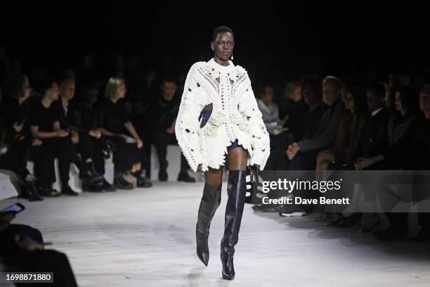 Model Alaato Jazyper walks the runway at the Alexander McQueen SS24 show during Paris Fashion Week at Le Carreau du Temple on September 30, 2023 in...