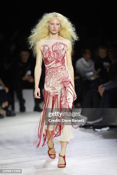 Model walks the runway at the Alexander McQueen SS24 show during Paris Fashion Week at Le Carreau du Temple on September 30, 2023 in Paris, France.