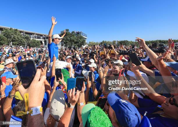 Carlotta Ciganda of Spain and The European Team celebrates as she is raised on team mates shoulders after she had clinched the result for The...