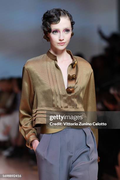 Model walks the runway at the Giorgio Armani fashion show during the Milan Fashion Week Womenswear Spring/Summer 2024 on September 24, 2023 in Milan,...