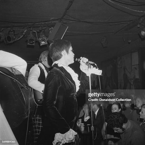 Singer Thelma Camacho of the rock and roll band "The First Edition" perform at the Bitter End night club on November 8, 1967 in New York, New York.