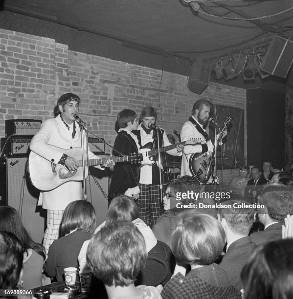 Mike Settle, Thelma Camacho, Terry Williams and bass player and singer Kenny Rogers of the rock and roll band "The First Edition" perform at the...