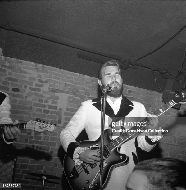 Kenny Rogers of the rock and roll band "The First Edition" performs at the Bitter End night club on November 8, 1967 in New York, New York.