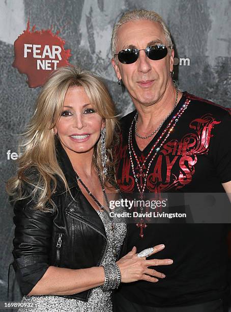 Singer Dee Snider and wife Suzette Snider attend the premiere of FEARnet's "Holliston" at Cinefamily on June 3, 2013 in Los Angeles, California.