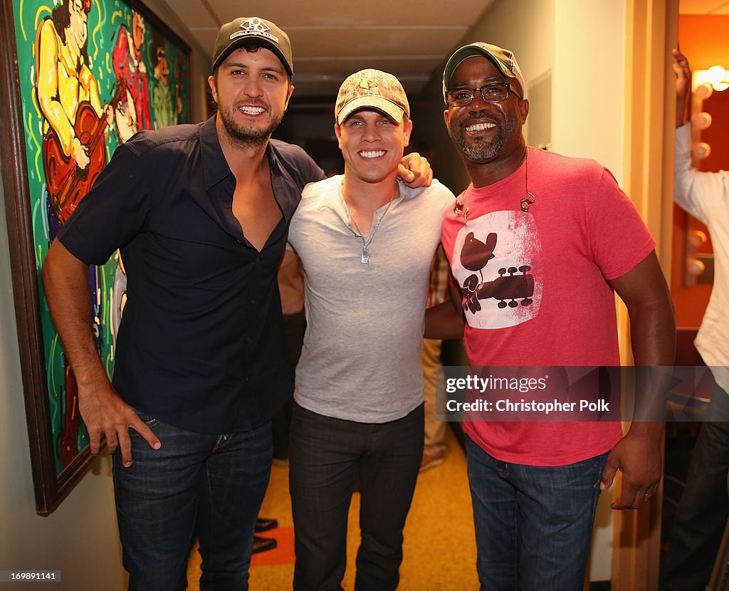 Dustin Rucker Luke Bryan, Dustin Lynch and Darius Rucker pose backstage during the ...