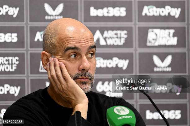Pep Guardiola the head coach / manager of Manchester City during his post match press conference during the Premier League match between...
