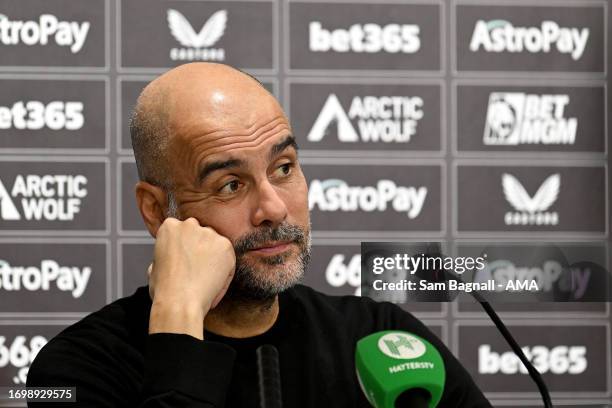 Pep Guardiola the head coach / manager of Manchester City during his post match press conference during the Premier League match between...