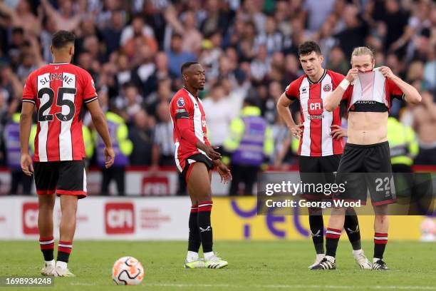 Tom Davies of Sheffield United reacts after Newcastle United scored their sides sixth goal during the Premier League match between Sheffield United...