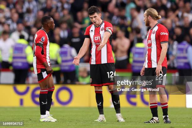 Tom Davies of Sheffield United reacts after Newcastle United scored their sides sixth goal during the Premier League match between Sheffield United...