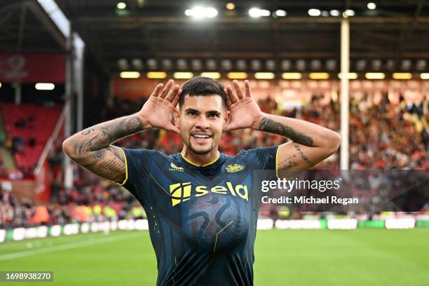 Bruno Guimaraes of Newcastle United celebrates after scoring the team's seventh goal during the Premier League match between Sheffield United and...