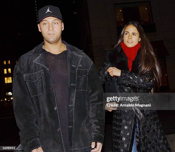 Yankees shortstop Derek Jeter and his girlfriend, actress Jordana Brewster, leave Barney's December 22, 2002 in New York City.