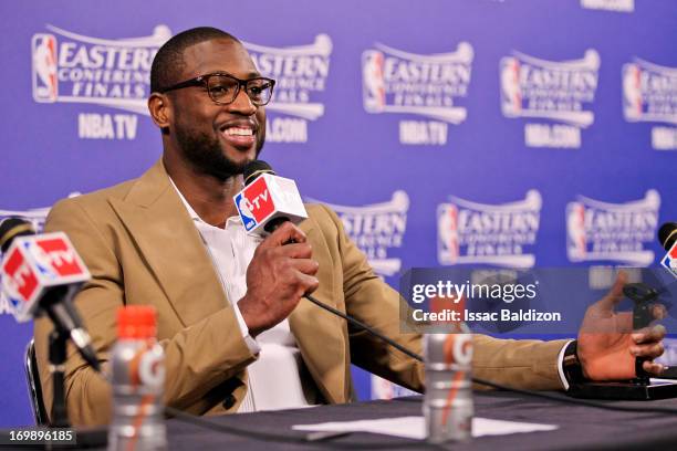 Dwyane Wade of the Miami Heat speaks at a press conference following his team's series victory against the Indiana Pacers in Game Seven of the...