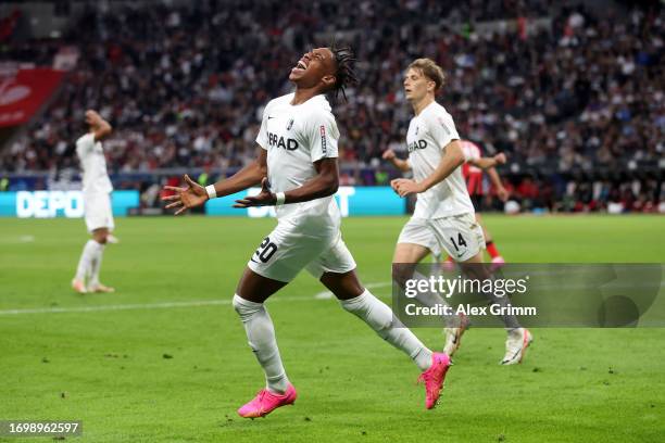 Junior Adamu of Sport-Club Freiburg celebrates after scoring the team's first goal which is later disallowed following a VAR check during the...