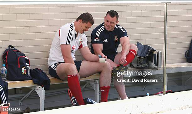 Ian Evans and Cian Healy talk as they prepare for the British and Irish Lions captain's run at NIB Stadium on June 4, 2013 in Perth, Western...