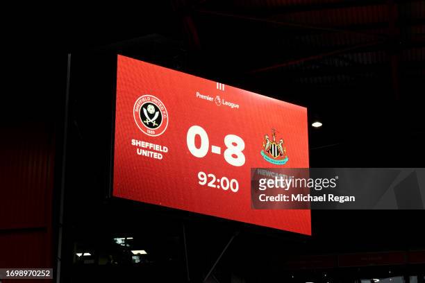 The LED board shows the 0-8 full time scoreline during the Premier League match between Sheffield United and Newcastle United at Bramall Lane on...