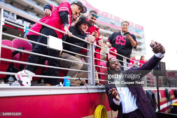 Richard Sherman interacts with fans at Levi's Stadium on September 21, 2023 in Santa Clara, California.