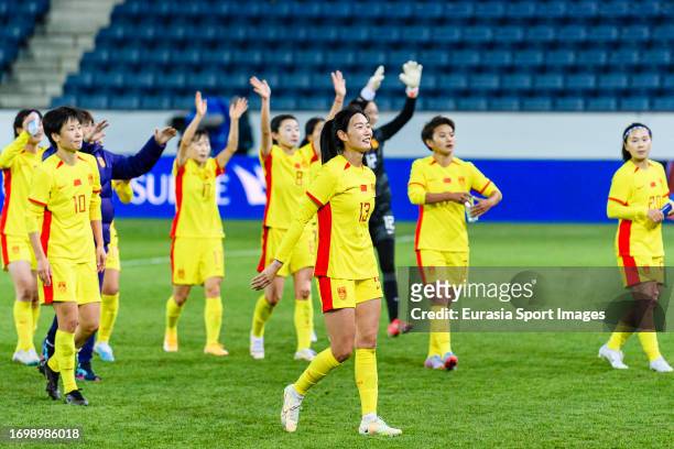 Yang Lina of China and her teammates thanks supporters for standing during the International Womens Friendly match between Switzerland and China at...