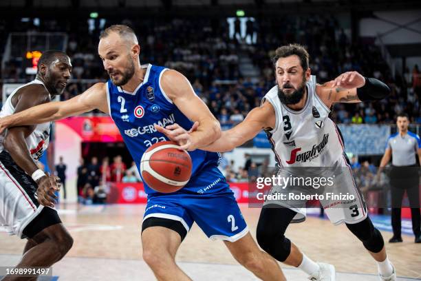 Miro Bilan of Germani Brescia and Marco Belinelli of Virtus Segafredo Bologna in action during the LBA FrecciaRossa Supercup 2023 Final match between...