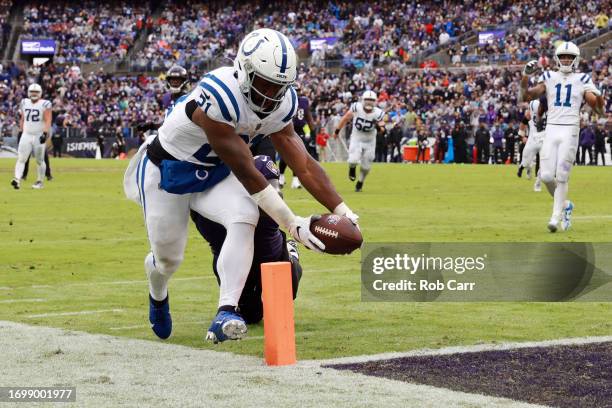 Zack Moss of the Indianapolis Colts scores a touchdown in the second quarter of a game against the Baltimore Ravens at M&T Bank Stadium on September...