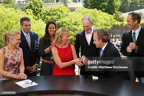 Chris McKendry, Chris Fowler, Mary Joe Fernandez, Brad Gilbert and Darren Cahill watch as Chris Evert is presented a ring commerating her entry into...