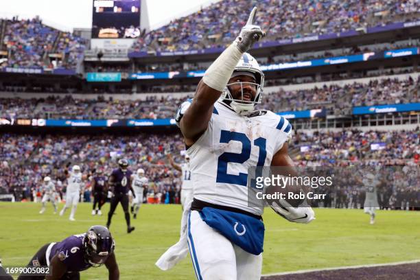 Zack Moss of the Indianapolis Colts celebrates after catching a second quarter touchdown pass against the Baltimore Ravens at M&T Bank Stadium on...