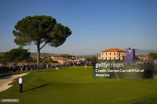 Wyndham Clark of Team United States fist pumps on the 13th hole during the Ryder Cup at Marco Simone Golf & Country Club on Saturday, September 30,...