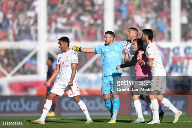 Lucas Carrizo and Lucas Chavez of Huracan celebrate the team's first goal scored by Ignacio Pussetto during a match between San Lorenzo and Huracan...