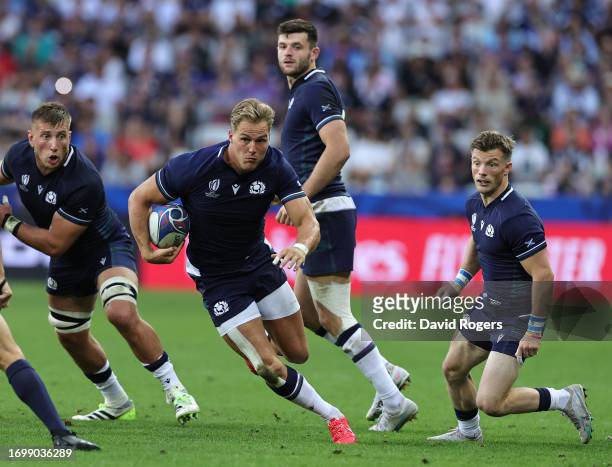 Duhan van der Merwe of Scotland charges upfield during the Rugby World Cup France 2023 group B match between Scotland and Tonga at Stade de Nice on...