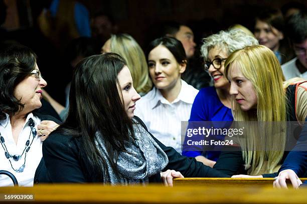 Aimee Pistorius, Oscar's sister, speaks to family in the Pretoria Magistrates court on June 4 in Pretoria, South Africa. Pistorius is accused of the...