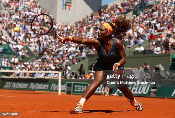 Serena Williams of United States of America plays a backhand during her Women's Singles Quarter-Final match against Svetlana Kuznetsova of Russia on...