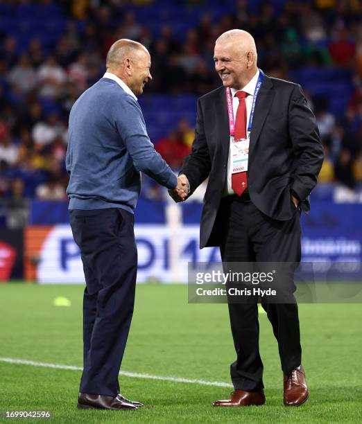 Eddie Jones, Head Coach of Australia, and Warren Gatland, Head Coach of Wales, shake hands during the warm up prior to the Rugby World Cup France...