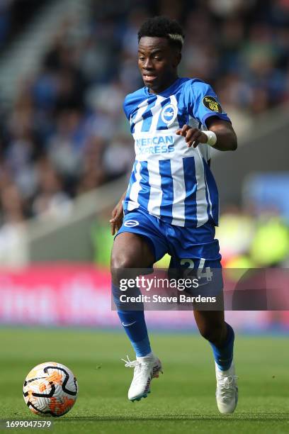 Simon Adingra of Brighton & Hove Albion runs with the ball during the Premier League match between Brighton & Hove Albion and AFC Bournemouth at...