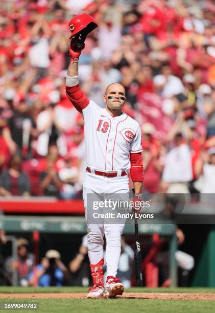 Joey Votto of the Cincinnati Reds acknowledges the crowd before his first at bat against the Pittsburgh Pirates at Great American Ball Park on...