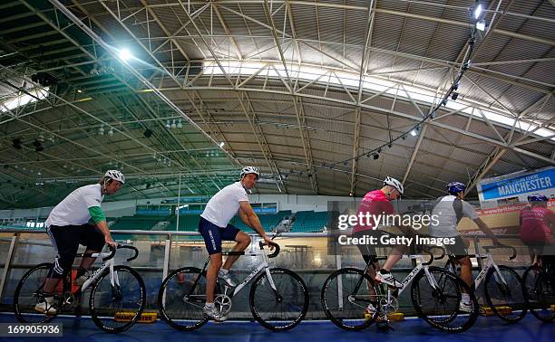 Laureus Academy Ambassador Michael Vaughan prepares to cycle during the PruProtect Chance to Ride Launch at the National Cycling Centre on June 4,...