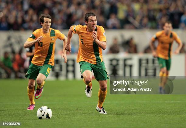 Mark Milligan of Australia in action during the FIFA World Cup qualifier match between Japan and Australia at Saitama Stadium on June 4, 2013 in...