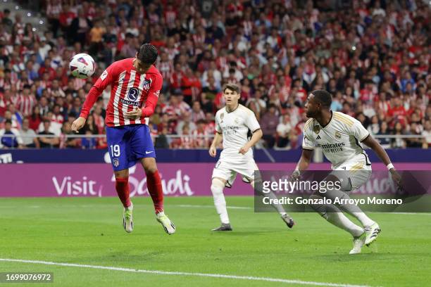 Alvaro Morata of Atletico Madrid scores the team's first goal during the LaLiga EA Sports match between Atletico Madrid and Real Madrid CF at Civitas...