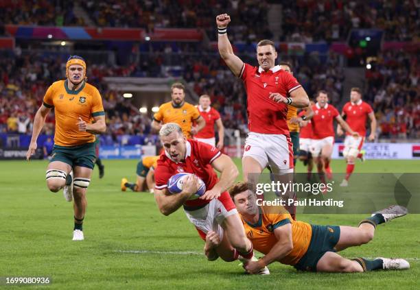 Gareth Davies of Wales scores the team's first try during the Rugby World Cup France 2023 match between Wales and Australia at Parc Olympique on...