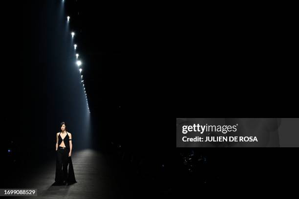 Model presents a creation for Ann Demeulemeester during the Paris Fashion Week Womenswear Spring/Summer 2024, in Paris on September 30, 2023.