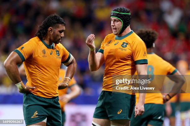 Nick Frost of Australia speaks with Robert Leota of Australia during the Rugby World Cup France 2023 match between Wales and Australia at Parc...