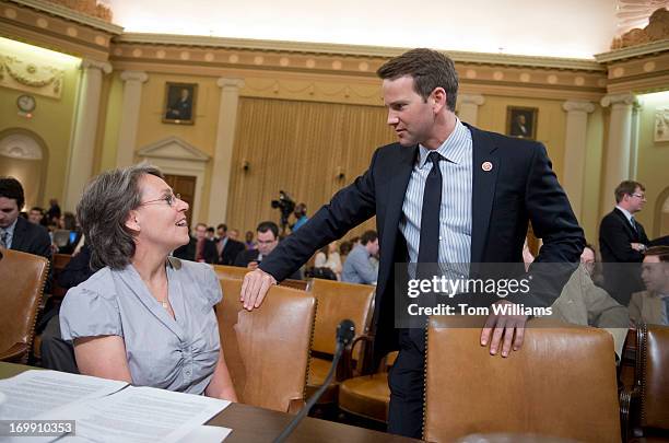 Sue Martinek of the Coalition for Life of Iowa, talks with Rep. Aaron Schock, R-Ill., before a House Ways and Means Committee hearing in Longworth...
