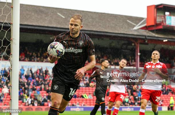 Blackpool's Jordan Rhodes celebrates scoring the opening goal during the Sky Bet League One match between Barnsley and Blackpool at Oakwell Stadium...